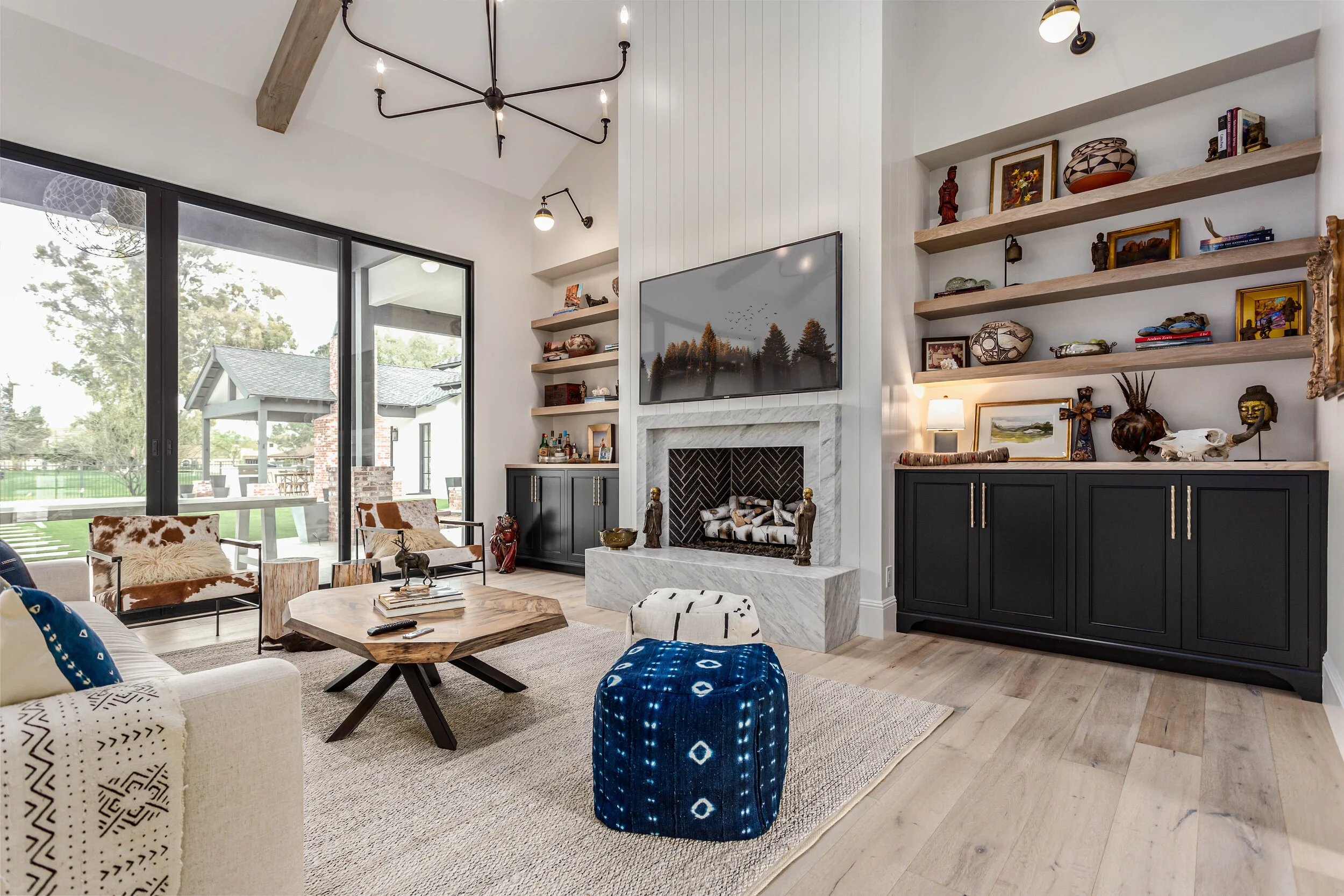 Custom built-in bookcases and entertainment center with walnut cabinetry in Franklin