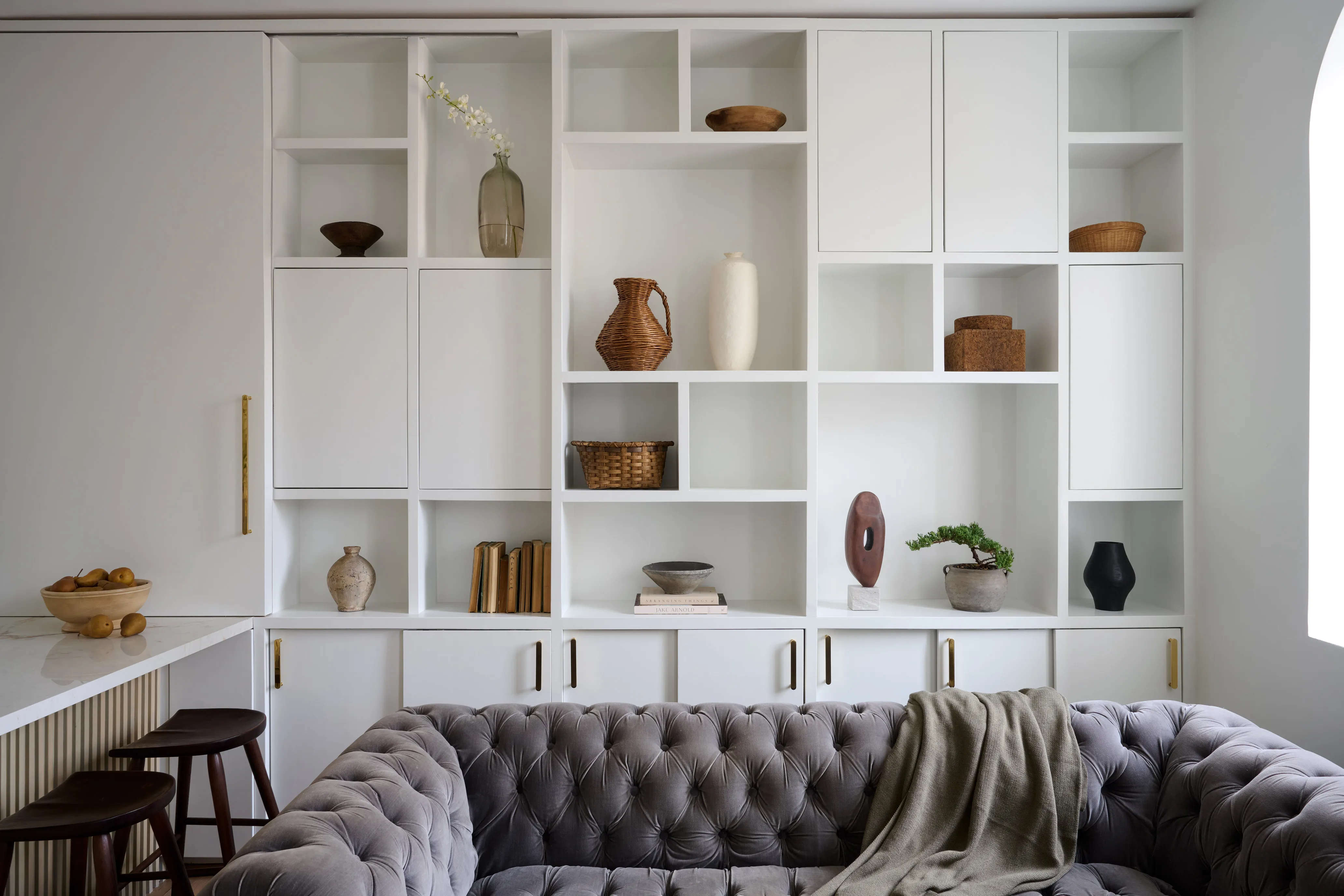 Custom built-in cabinets and bookshelves with walnut millwork in a Franklin TN home office